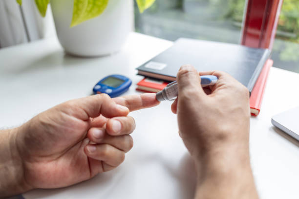 istock Mature man checking blood sugar 1719106519