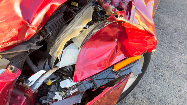istock Damaged headlight on car after accident, close up 1719121031