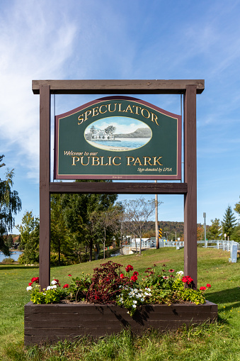 Speculator, NY USA - September 27, 2023: Welcome to Speculator NY sign in the Adirondacks on an early fall sunny afternoon