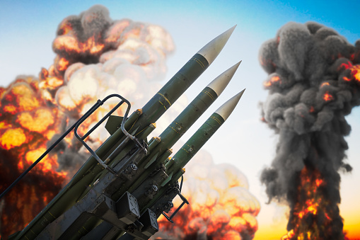 Warhead missiles and explosions in background. War concept. 3D rendered illustration.