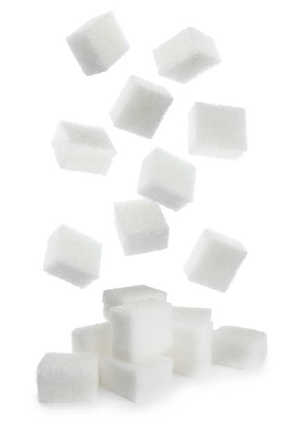 istock Flying cubes of sugar on white background 1719190263
