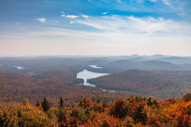 istock Adirondacks mountain range view from Mt Arab fire tower with brilliant fall foliage on a sunny afternoon 1719190296
