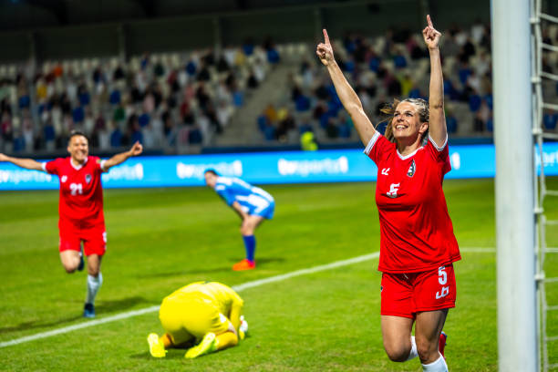 istock Soccer player running after scoring a goal 1719200561