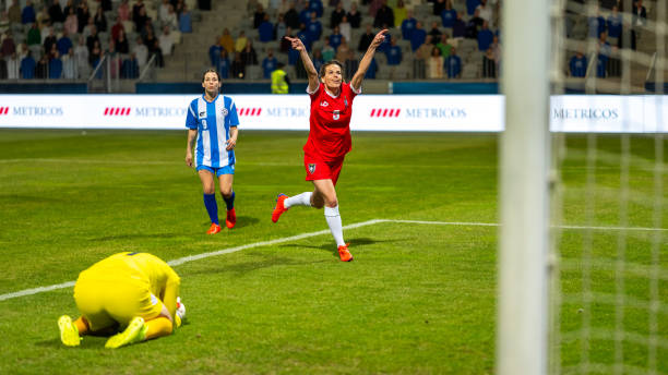 istock Soccer player running after scoring a goal 1719200562