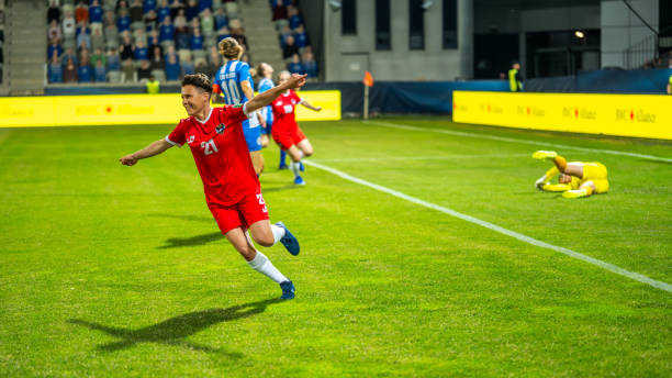 istock Soccer player running after scoring a goal 1719200565