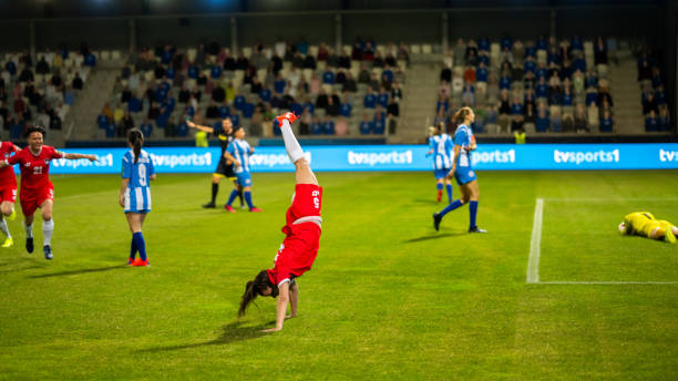 istock Soccer team celebrating after scoring a goal 1719200580