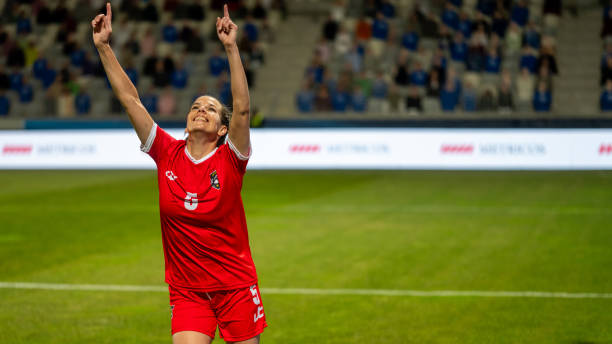 istock Soccer player running after scoring a goal 1719200583