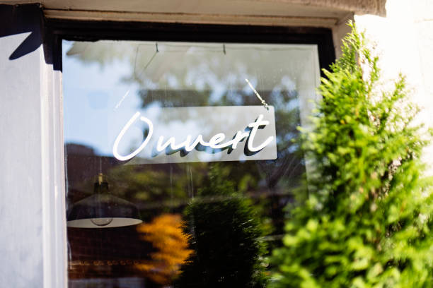 istock Storefront sign open in french ouvert. 1719208714
