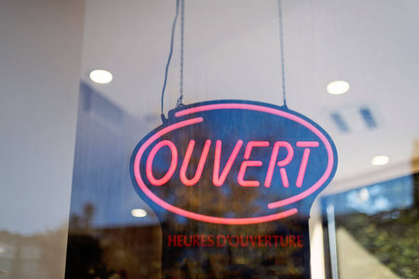 istock Storefront sign open in french ouvert. 1719208934