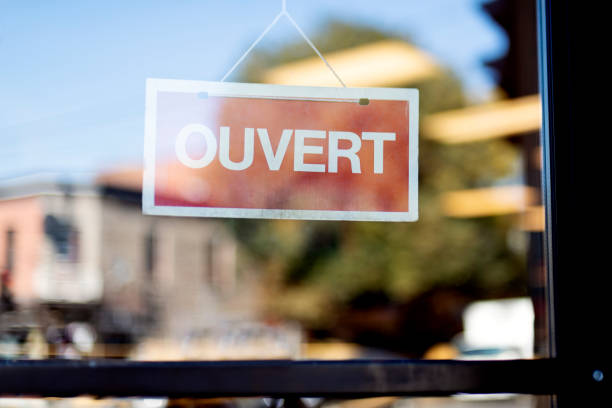 istock Storefront sign open in french ouvert. 1719209230