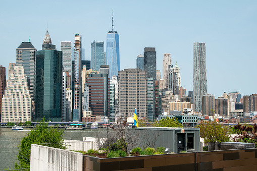 A breathtaking view of Manhattan's iconic skyscrapers, captured from the vantage point of Brooklyn Heights, New York City, USA.