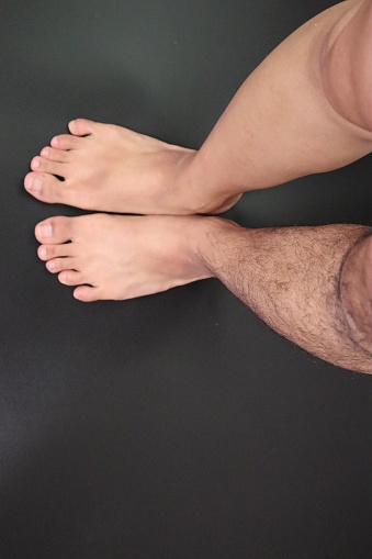 Close-up of legs before and after hair removal