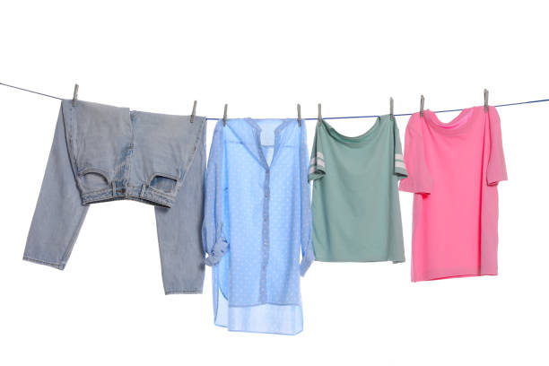 istock Different clothes drying on washing line against white background 1719283444