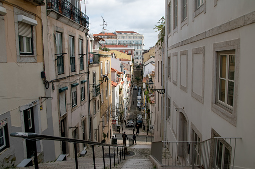 Sun-kissed Lisbon, Portugal, boasts charming European streets adorned with colorful buildings, cobblestone paths, and vibrant cafes, creating a cozy, picturesque atmosphere.