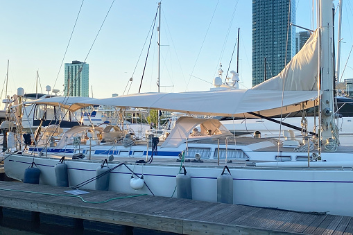 Small sailing boats moored in the yacht club of Sanxenxo on a clear Summer day, Pontevedra, Spain.