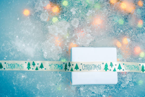 Christmas and New Year winter holidays abstract background with shiny Christmas lights and copy space with product placeholder