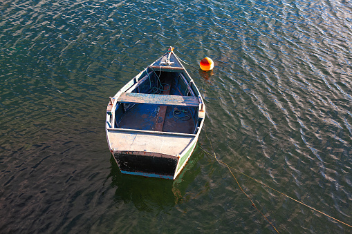 Fishing boat on the water surface , view from above