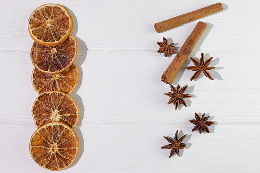 Orange Cinnamon Anise on wooden background, christmas decoration