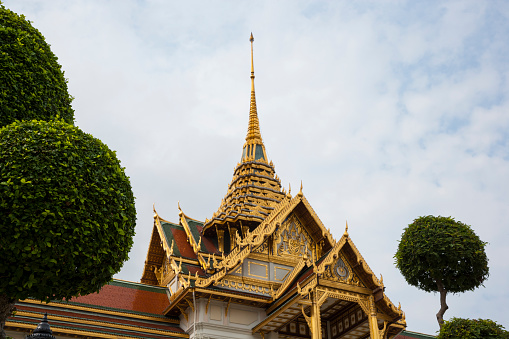 Bangkok, Thailand - April 5, 2011: Phra Thinang Chakri Maha Prasat, a building with a blend of Thai traditional architecture and a combination of 19th-century European styles.