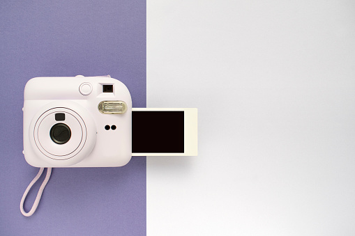 Polaroid camera and copy space.