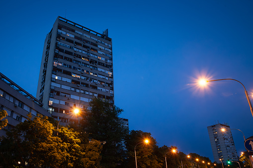 Picture of socialist buildings of Novi Beograd in Blok in Belgrade, Serbia at dusk in the evening. They are typical of the communist architectural trend called brutalism.