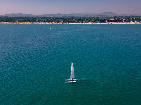 Sailing catamaran in the Adriatic Sea Aerial view