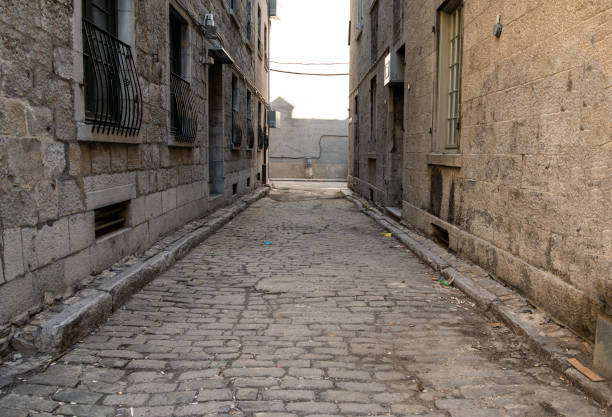 istock Grungy alleyway in Montreal Quebec 1719634583