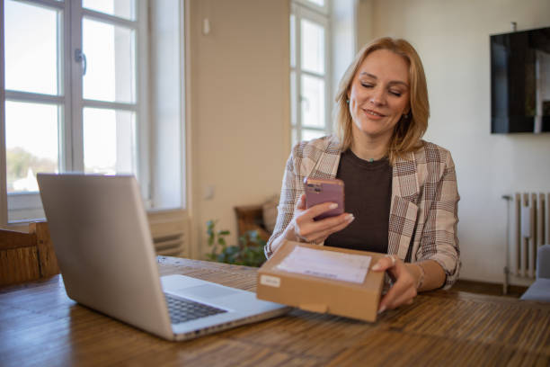 istock Entrepreneur is sending a package to a customer 1719677155