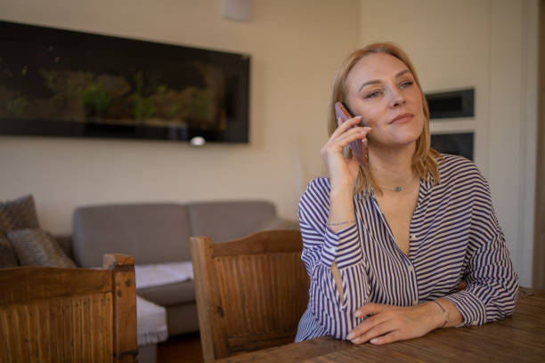 istock Happy mature woman using phone 1719678831