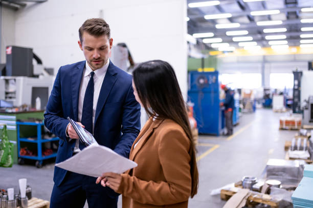 istock Production manager and business client in production 1719679356