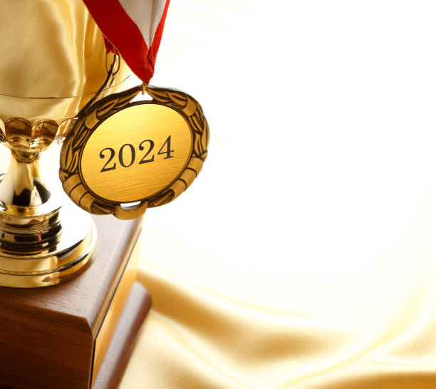 istock Gold Medal and Trophy With Year 2024 1719685990