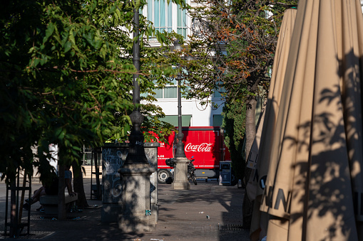 Distribution truck with the Coca Cola logo on a street in the Spanish capital, this North American brand is seen in many parts of the world. Madrid. Spain. July 28, 2023.