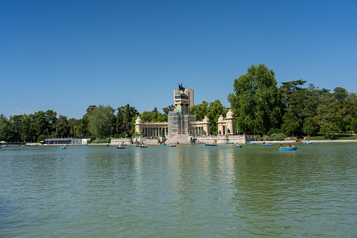 Big pond in the El Retiro park with boats on a summer day in the Spanish capital. Madrid. Spain. July 28, 2023.