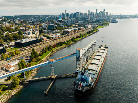 A bulk carrier ship is at the grain loading terminal in Seattle Washington