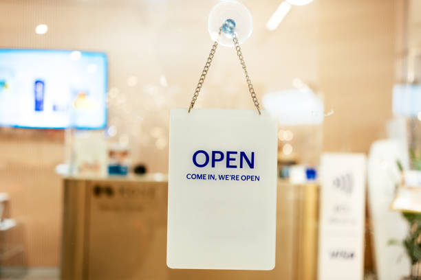 istock Store open sign hanging on the window 1719839730
