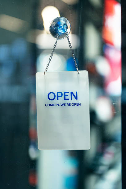 istock A shop door with a sign saying open 1719839762