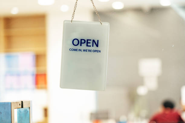 istock Open sign in shop window 1719840337