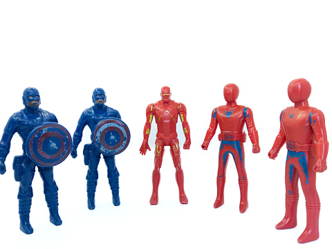 photo of a worn Avengers superhero toy, white background
