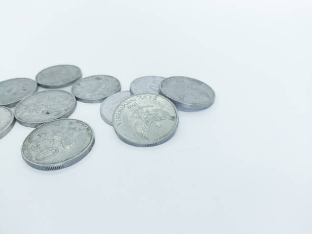 istock a collection of silver coins worth five hundred rupiah in white 1719843610