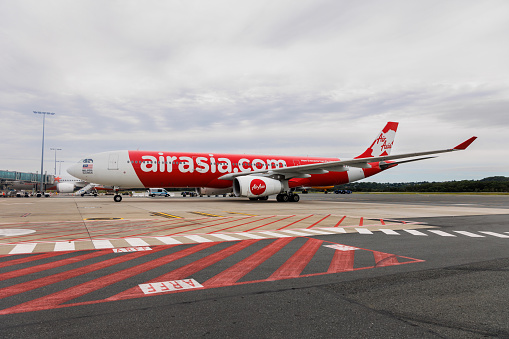 Gold Coast, Australia - April1, 2023: Air Asia X Airbus A330 on airport apron at Gold Coast Airport from Kuala Lumpur, Malaysia