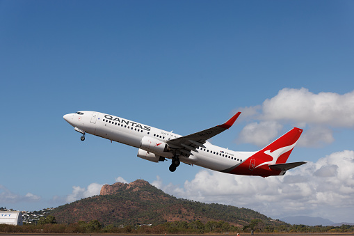 Gold Coast, Australia - 28 July 2021: Qantas Boeing 737-800 taking off at Townsville Airport, Queensland (TSV)
