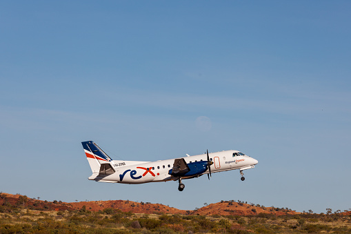 Mount Isa, Queensland - 27 July 2021: Rex Airlines Saab 340 aircraft taking from from Mount Isa airport in outback Queensland.