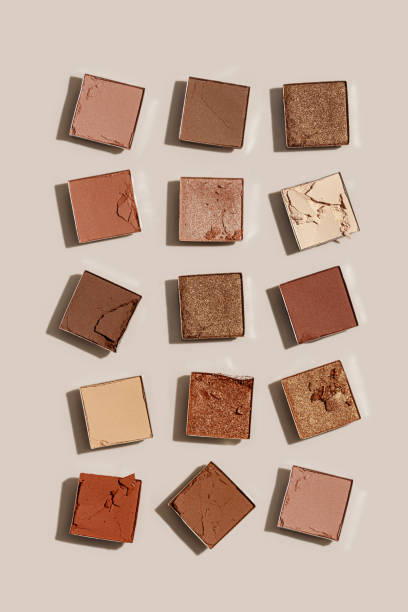 istock Beauty product neutral color eyeshadows for makeup, beige monochrome pattern on light background, flat lay with nude colors swatches eyeshade, cosmetic texture, beige color palette, top view pattern 1719860873