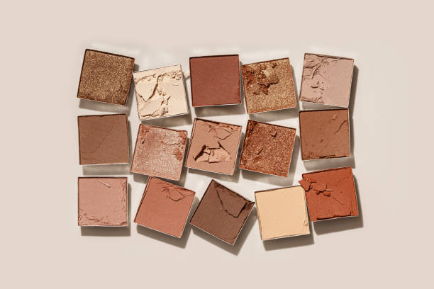 istock Beauty product neutral color eyeshadows for makeup, beige monochrome pattern on light background, flat lay with nude colors swatches eyeshade, cosmetic texture, beige color palette, top view pattern 1719860890