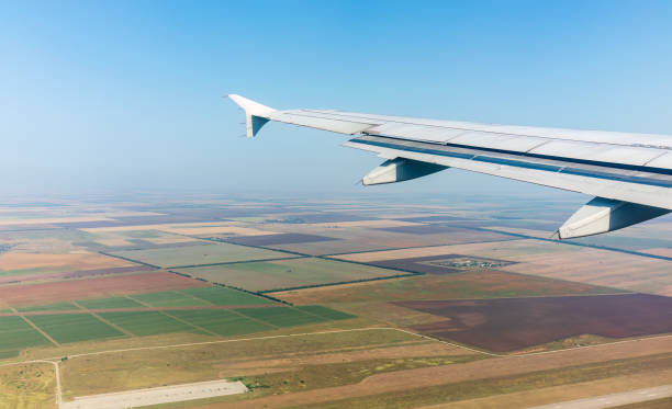 istock View from the airplane window during taking off on a clear summer morning 1719904112