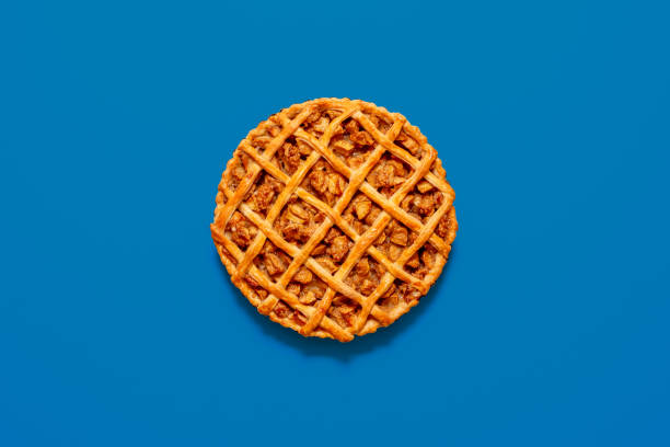 istock Apple pie homemade, above view on a blue table 1719904893