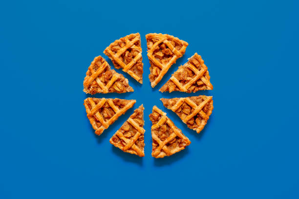 istock Homemade apple pie minimalist on a blue table 1719904897