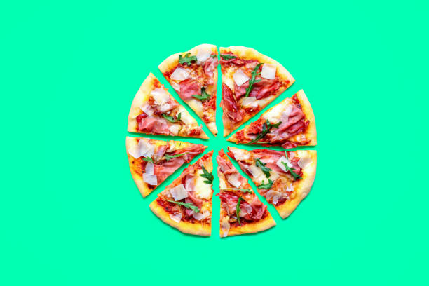 istock Homemade ham pizza minimalist on a green background 1719926498