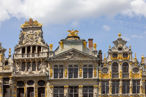 Brussels; Belgium - May 17; 2023: Facades of medieval baroque tenement houses. These are magnificent halls of the former Brussels guilds in Grand Place