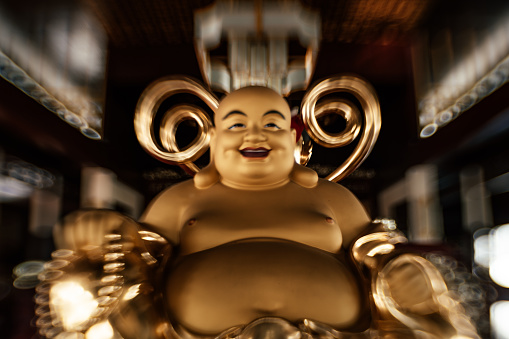 istock Medium shot of Golden Buddha statue 1719943810